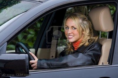 woman pretty smiles and drives